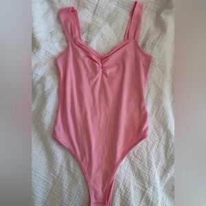 Pink bodysuit
